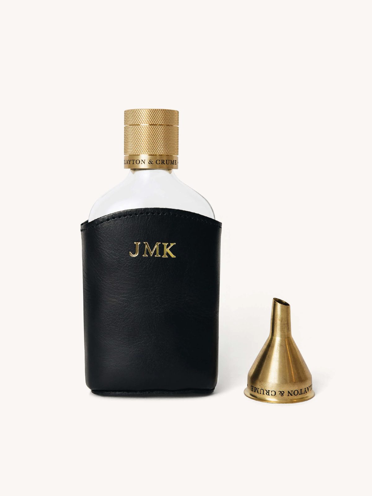 Clayton and Crume glass flask in its leather sleeve, product photograph