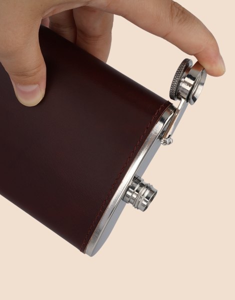 Hip flask drying upside down with the cap removed after cleaning